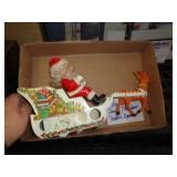 VINTAGE BATTERY POWERED SANTA SLED