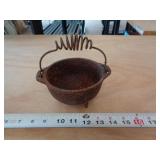 SMALL FOOTED CAST IRON POT
