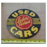 CAST IRON USED CAR SIGN 10' ACROSS CAST IRON USED CAR SIGN 10' ACROSS