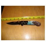 SPRING OPEN LOCK BACK KNIFE