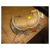 RESIN CAST SADDLE BIRDHOUSE