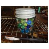 SMALL JAR OF MARBLES