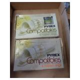 2 - PACKS OF PYREX NAPKIN RINGS