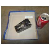 FOSSIL IN BLACK MARBLE PAPERWEIGHT