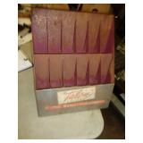 OLD METAL ZIPPER RACK / UT