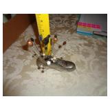 METAL SHOE WITH 23 HAT PINS