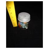 SMALL JAR OF VINTAGE MARBLES