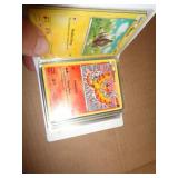 SMALL ALBUM OF POKEMON CARDS
