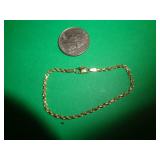 14KT GOLD BRACELET 2 3/4' CL 3.21 GRAMS /0.113 OZ 14KT GOLD BRACELET 2 3/4' CL 3.21 GRAMS /0.113 OZ