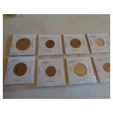 8 FOREIGN COINS