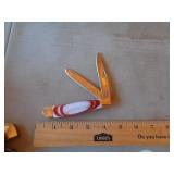 RED & WHITE 2 BLADE KNIFE