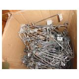 GOOD SIZED BOX OF METAL PEG BOARD HANGERS