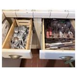 2 drawers of stainless & cabinets below