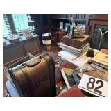 Contents of oak table' bookends, cow bell, etc.