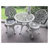 Cast iron tabke & two chairs
