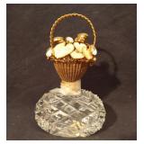 Perfume bottle with brass and stone accent