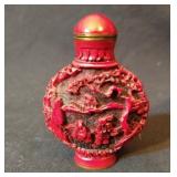 Red laquer snuff bottle signed