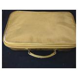 Sm gold suitcase