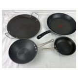 Four Frying Pans.