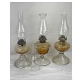 Three Glass Hurricane Oil Lamps.