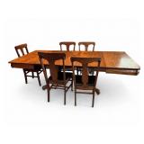 Dinning Table W/Five Chairs, & Five Table Leafs.