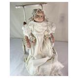 VTG Porcelain Doll w/Purple Eyes & Wicker Stroller