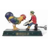 Toyodo & Co Wind Up Tin Toy Boy With Rooster