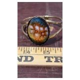 Gold Tone Clamper Bracelet with Stone