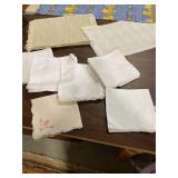 Assortment of placemats and cloth napkins