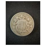 back side of 1869 Shield Nickel