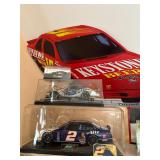 NASCAR Cars and Keystone Beer Sign