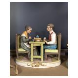 Vintage Ceramic Figurine Featuring Couple at Dinne