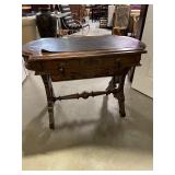 Antique wood gaming table on wheels