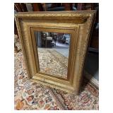 Antique Giltwood Wall Mirror with an Ornate Regenc