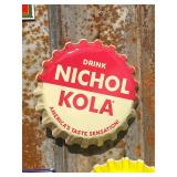 Nichol Kola Cap Sign