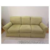 3 cushion green sofa