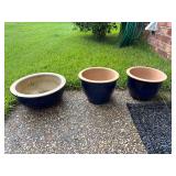 3 blue planters