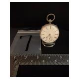 antique open-face silver pocket watch