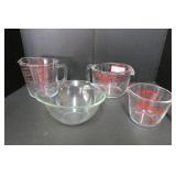 Four Pyrex Measuring Cups