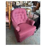 Maroon swivel chair