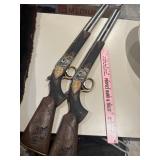 2 resin gun wall hangers
