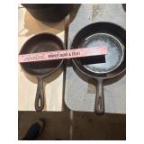 2 cast iron pans