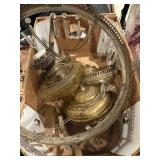 Ornate hanging brass chandelier with glass