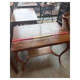 Antique wooden library table or writing desk with