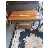 Antique wooden library table or writing desk with