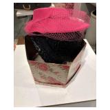 Hat box with ladies hats and vails