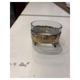 Vintage footed glass bowl inside gold medal