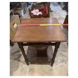 Antique two tier side table with turned legs and