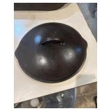12" vintage cast iron lid, appears warped