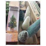 Six small decorative Christmas trees two white